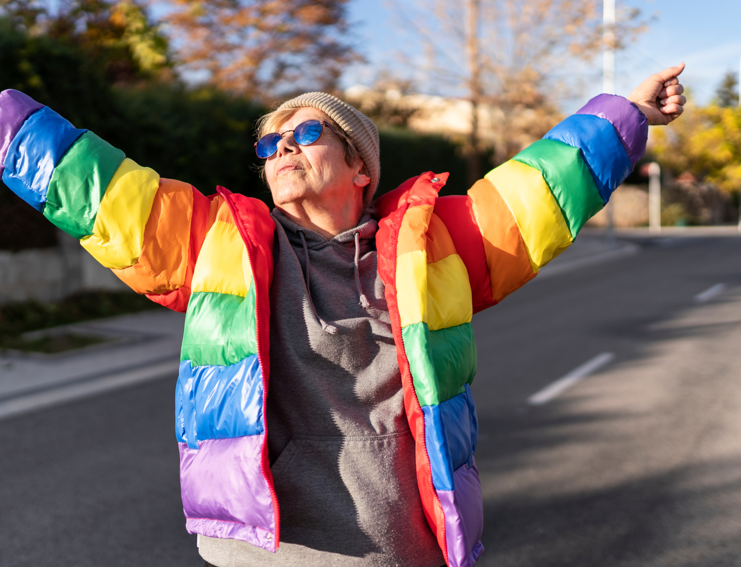 Someone with a pride flag jacket